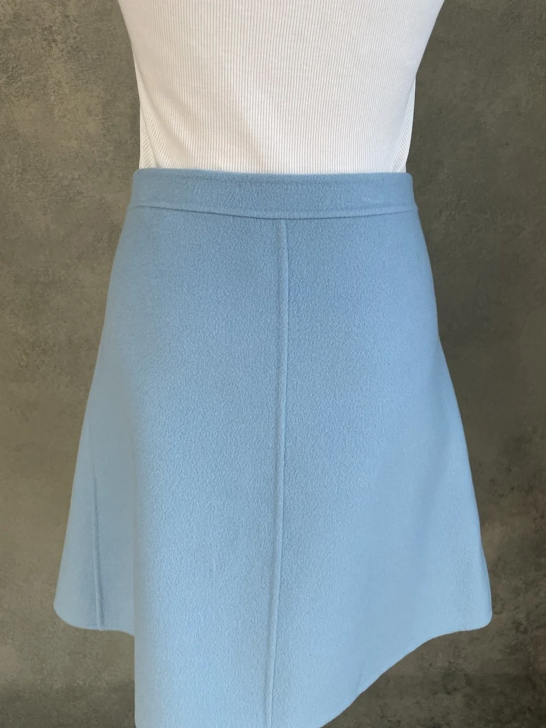 Close-up of the upper back panel and clean waistband finish