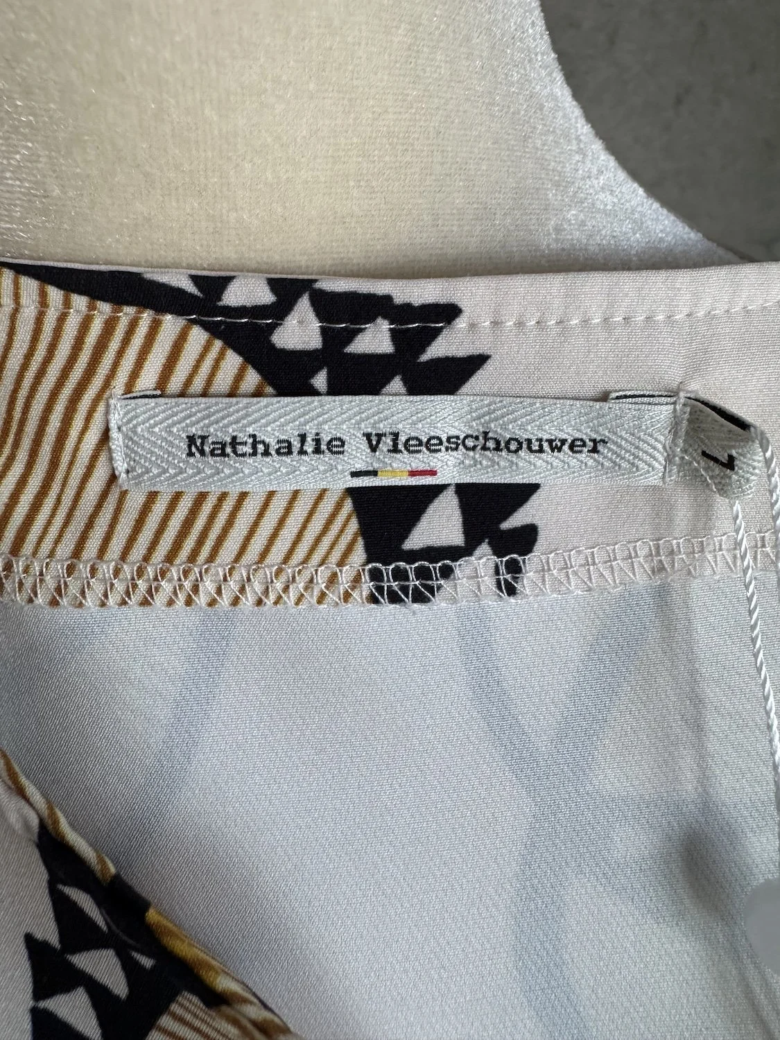 Nathalie Vleeschouwer interior brand label showing size 3