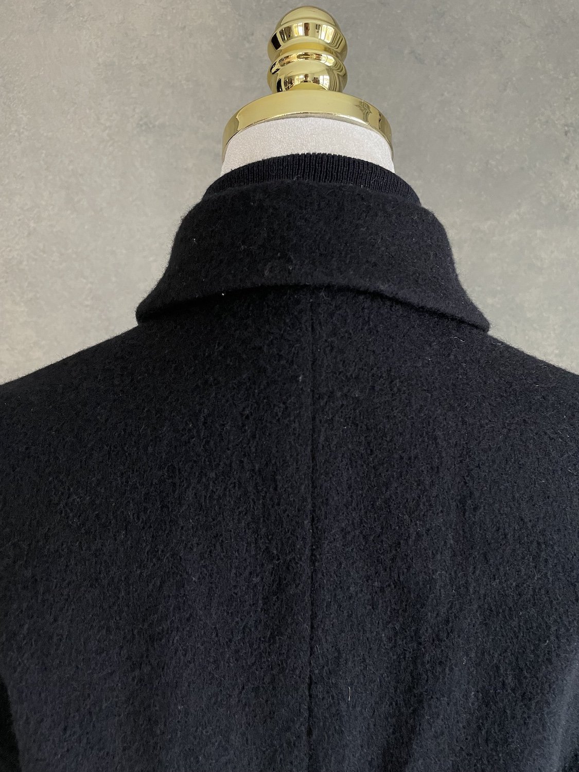 Gigue black coat back collar and seam detail view