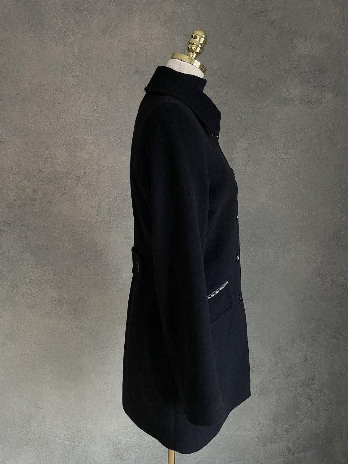 Scapa black coat side profile view on mannequin