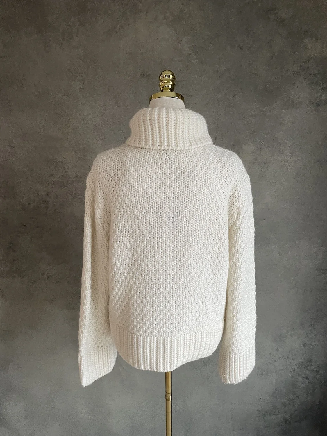 Close-up of the back basketweave knit pattern.