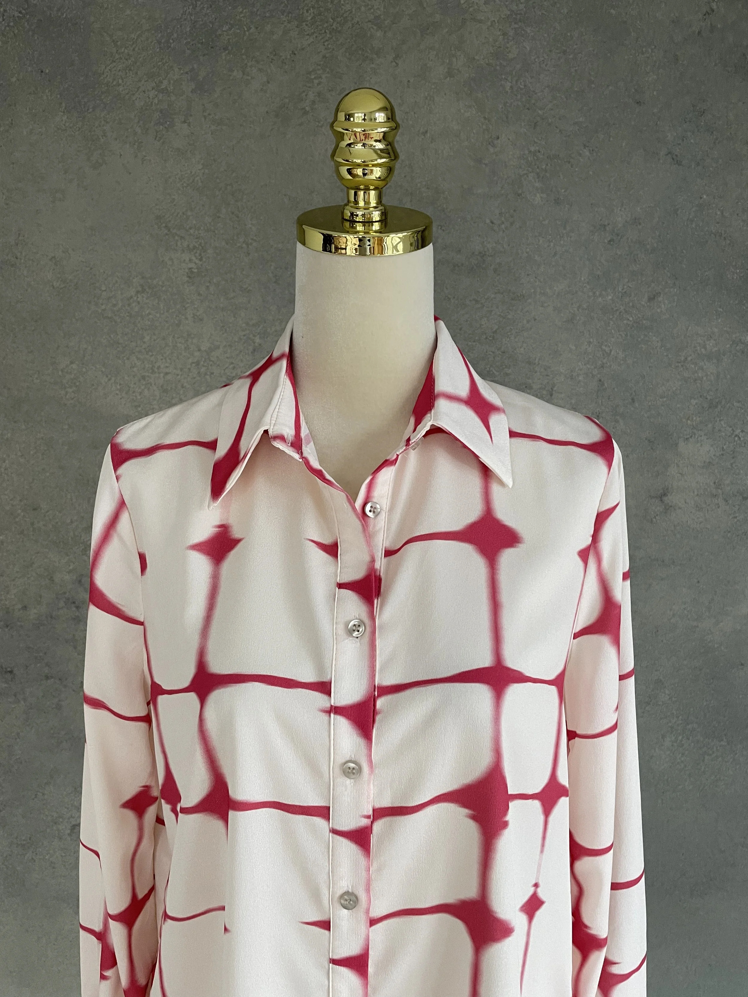 Front view of the blouse, highlighting the relaxed fit.
