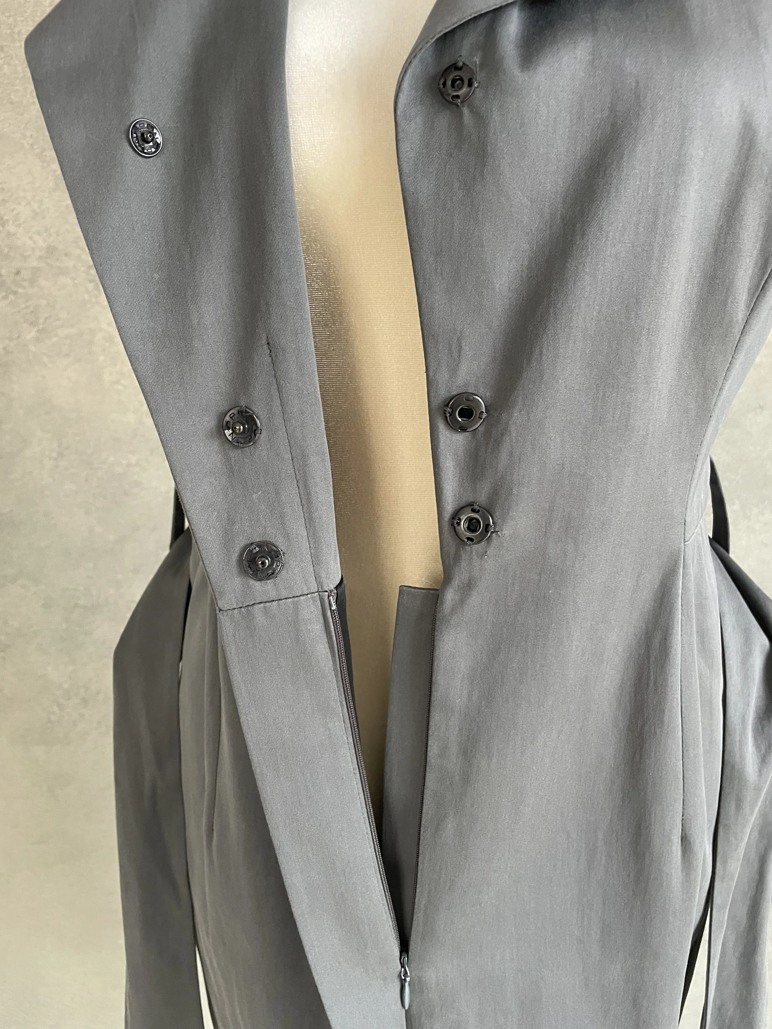 Natan dress interior showing snap button closure and quality construction