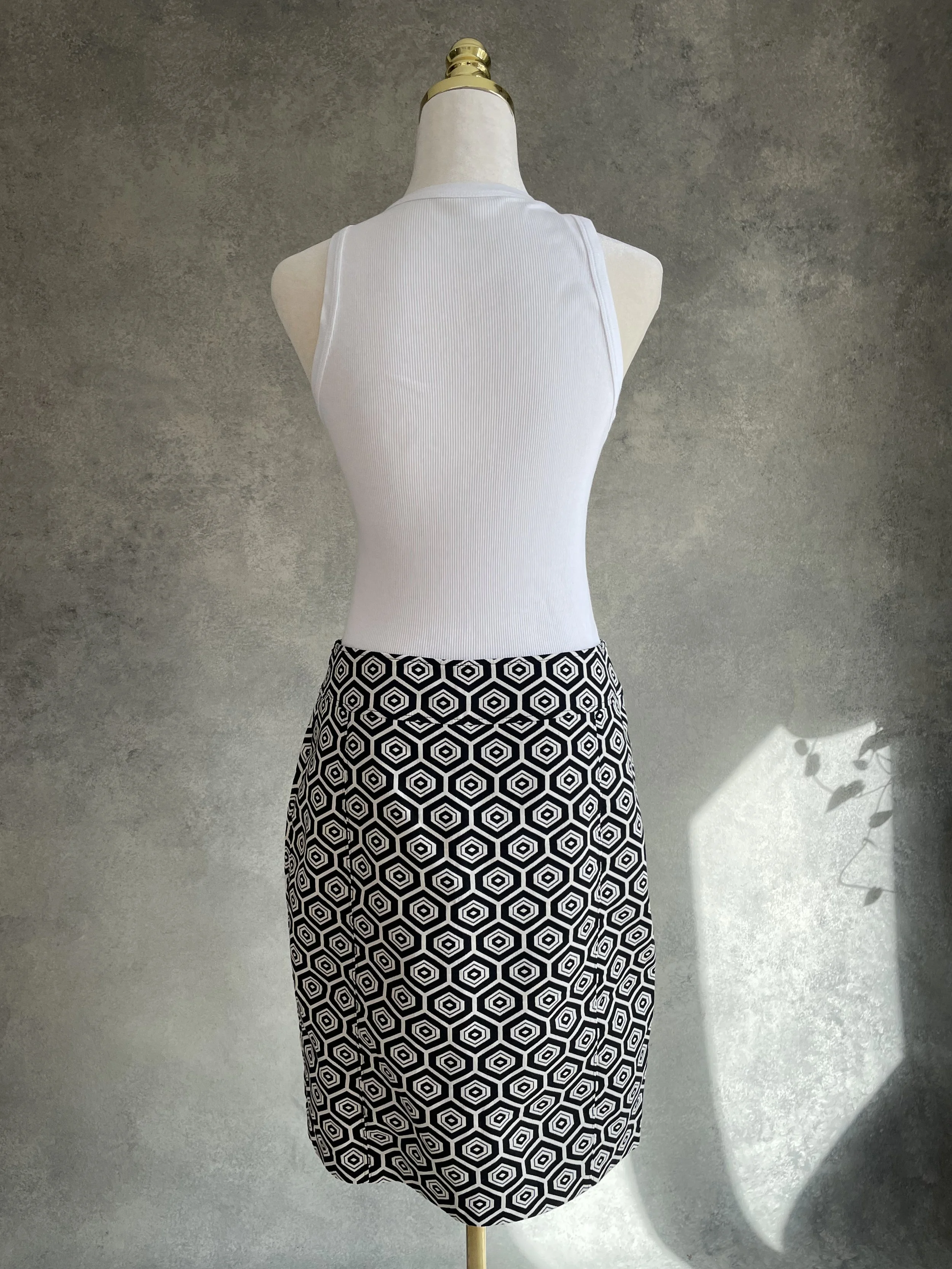 Back view of the Caroline Biss skirt, clean lines and construction.