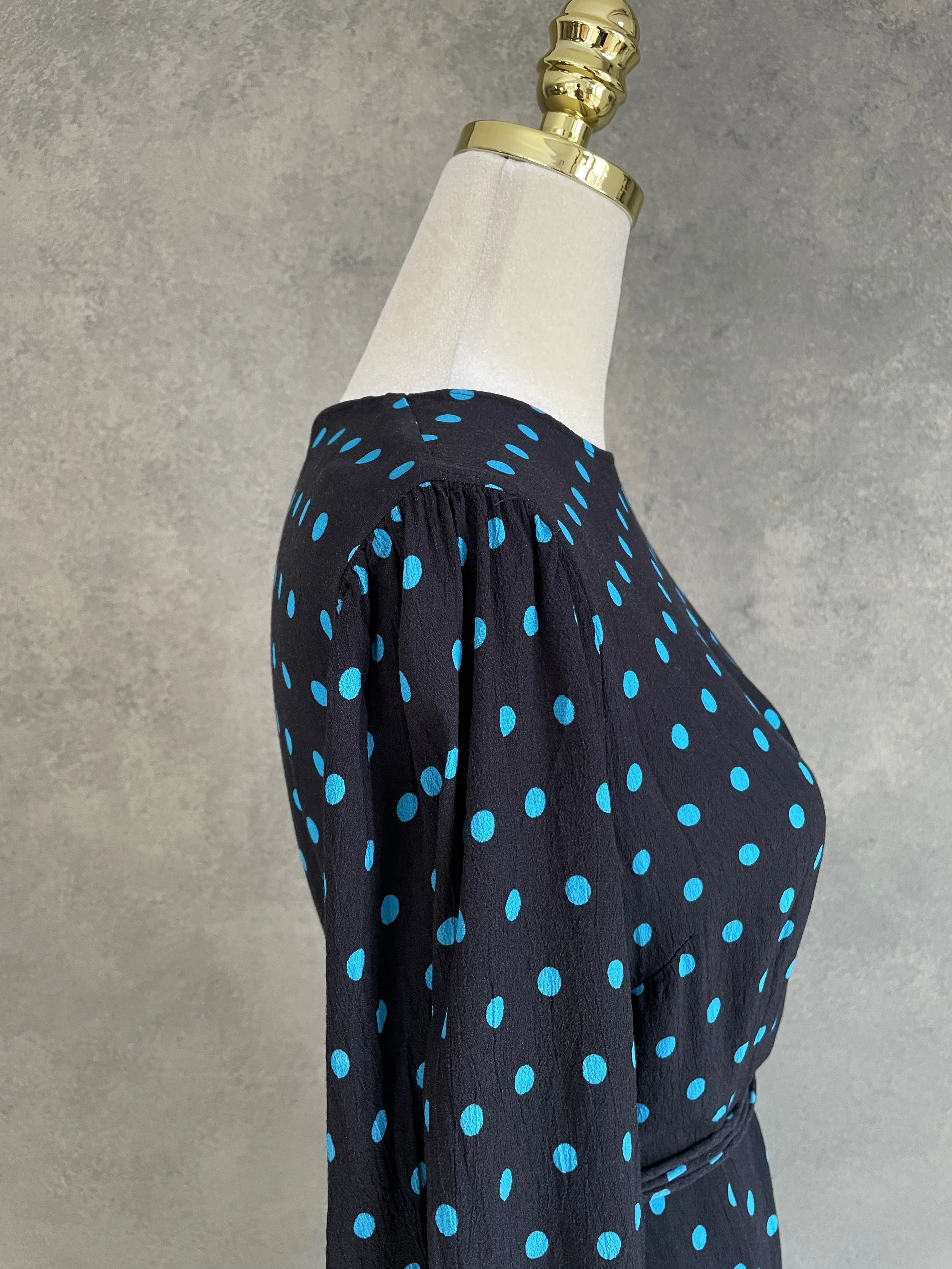 Close-up of the shoulder and sleeve construction on the Essentiel Antwerp dress.