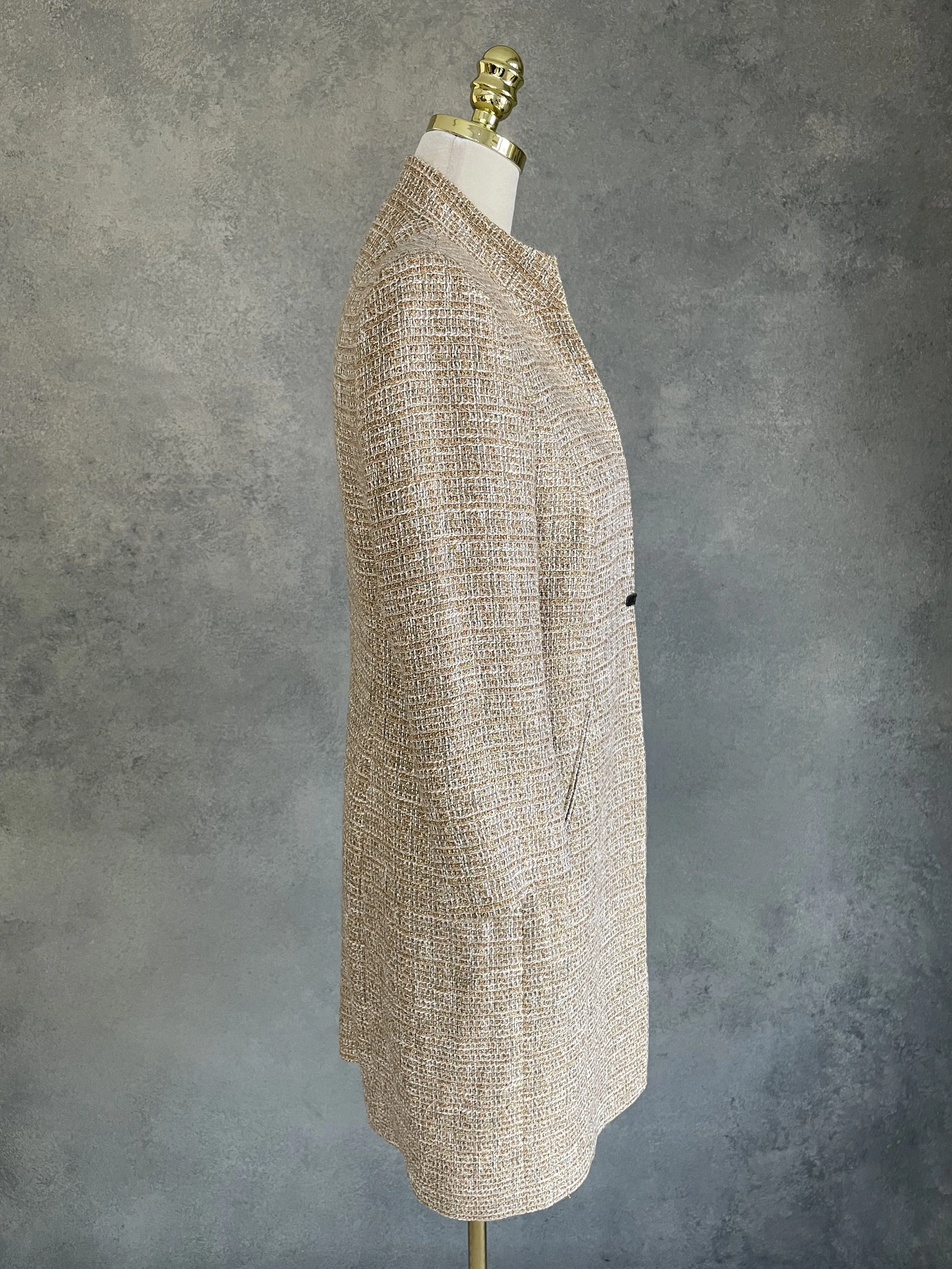 Side profile view of the Scapa coat showing the streamlined fit.