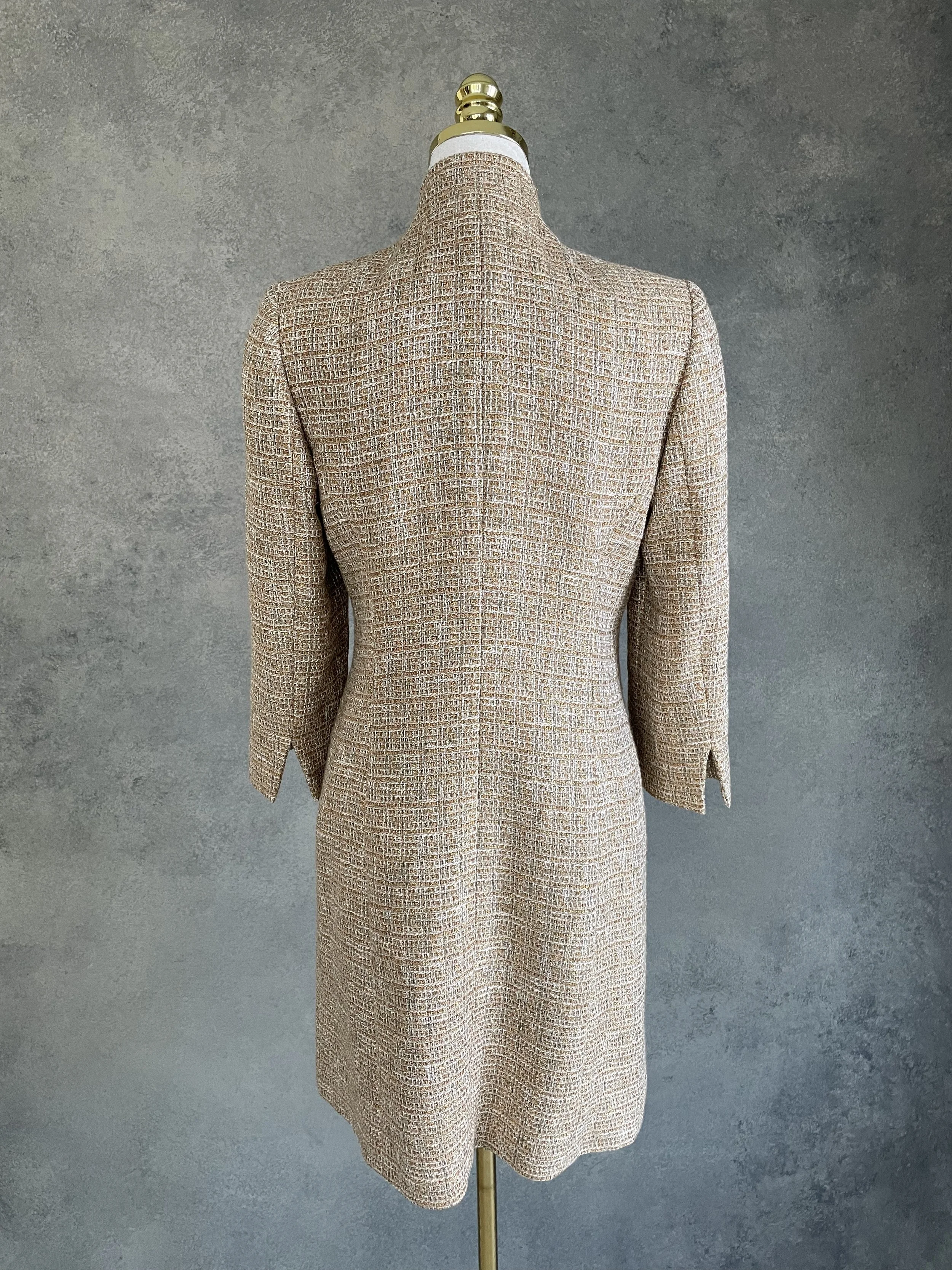 Back view of the Scapa coat, highlighting the tailored silhouette and design.