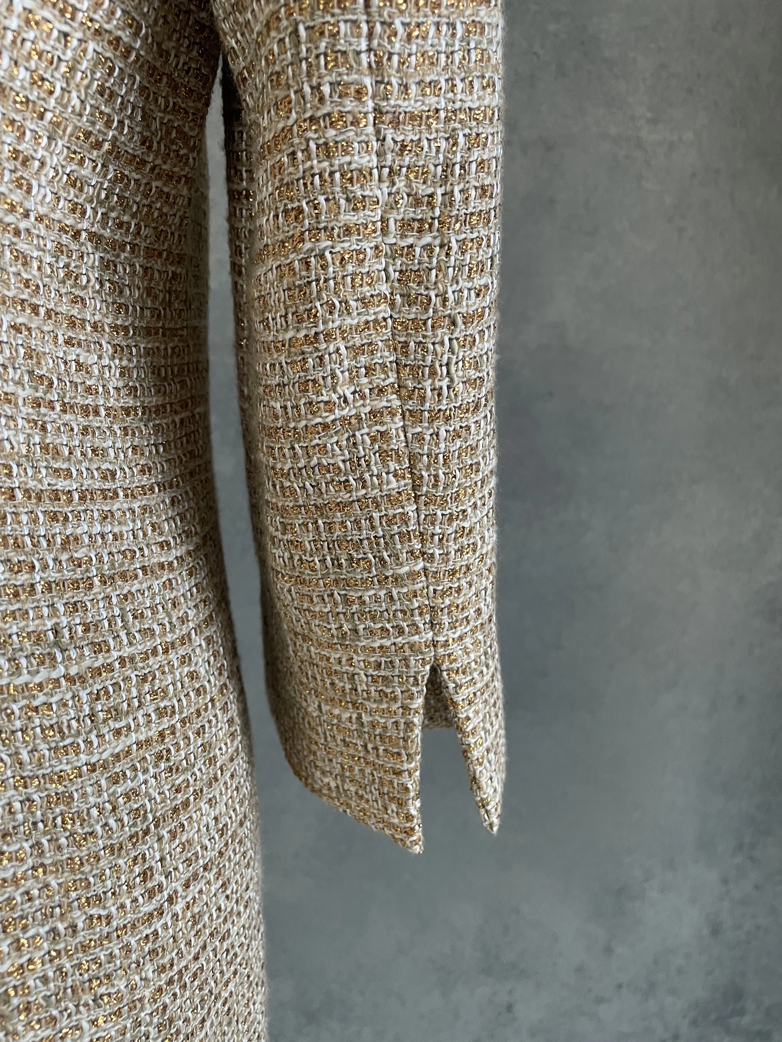 Detailed shot of the sleeve cuff with side slit detail on the Scapa coat.