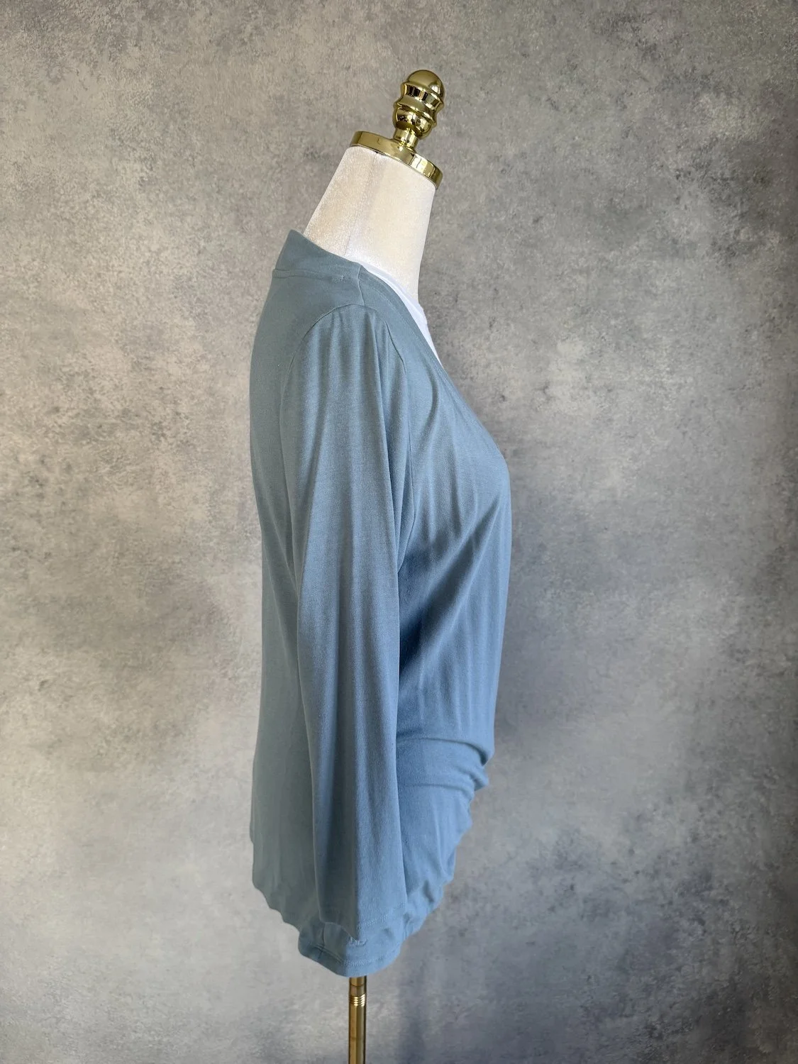 Ralph Lauren aqua blue jersey wrap top side profile view on mannequin