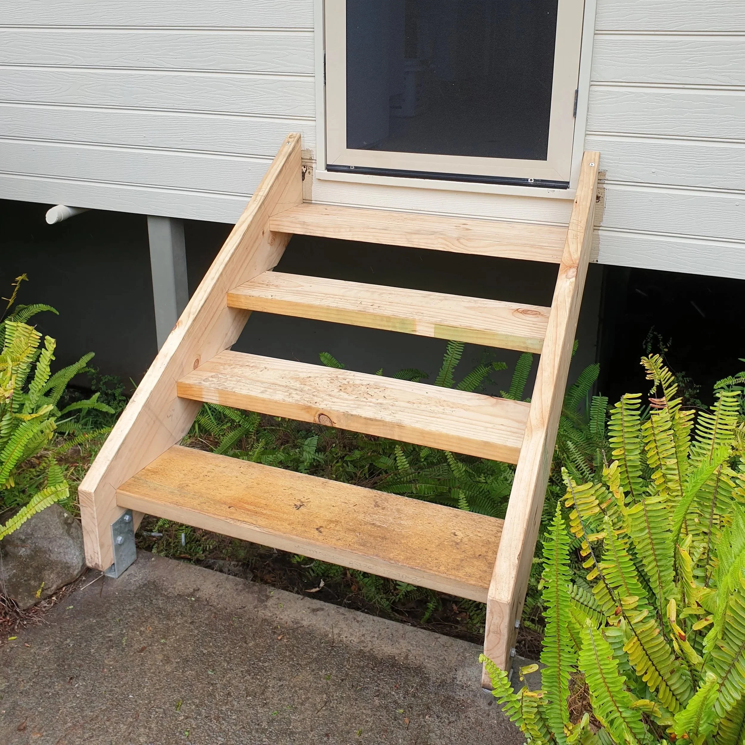 wooden stairs, external, back door.
