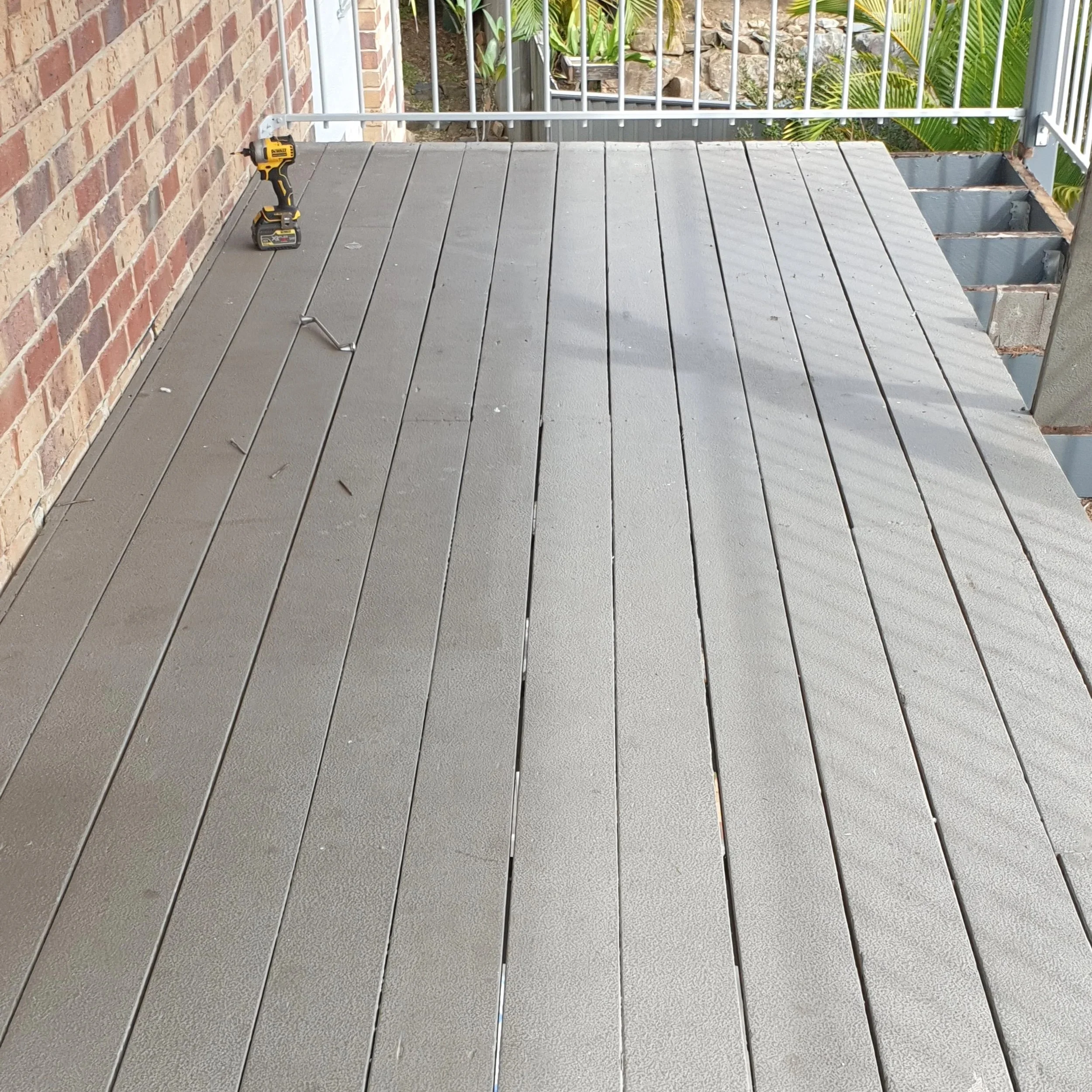 grey painted, external timber balcony deck.