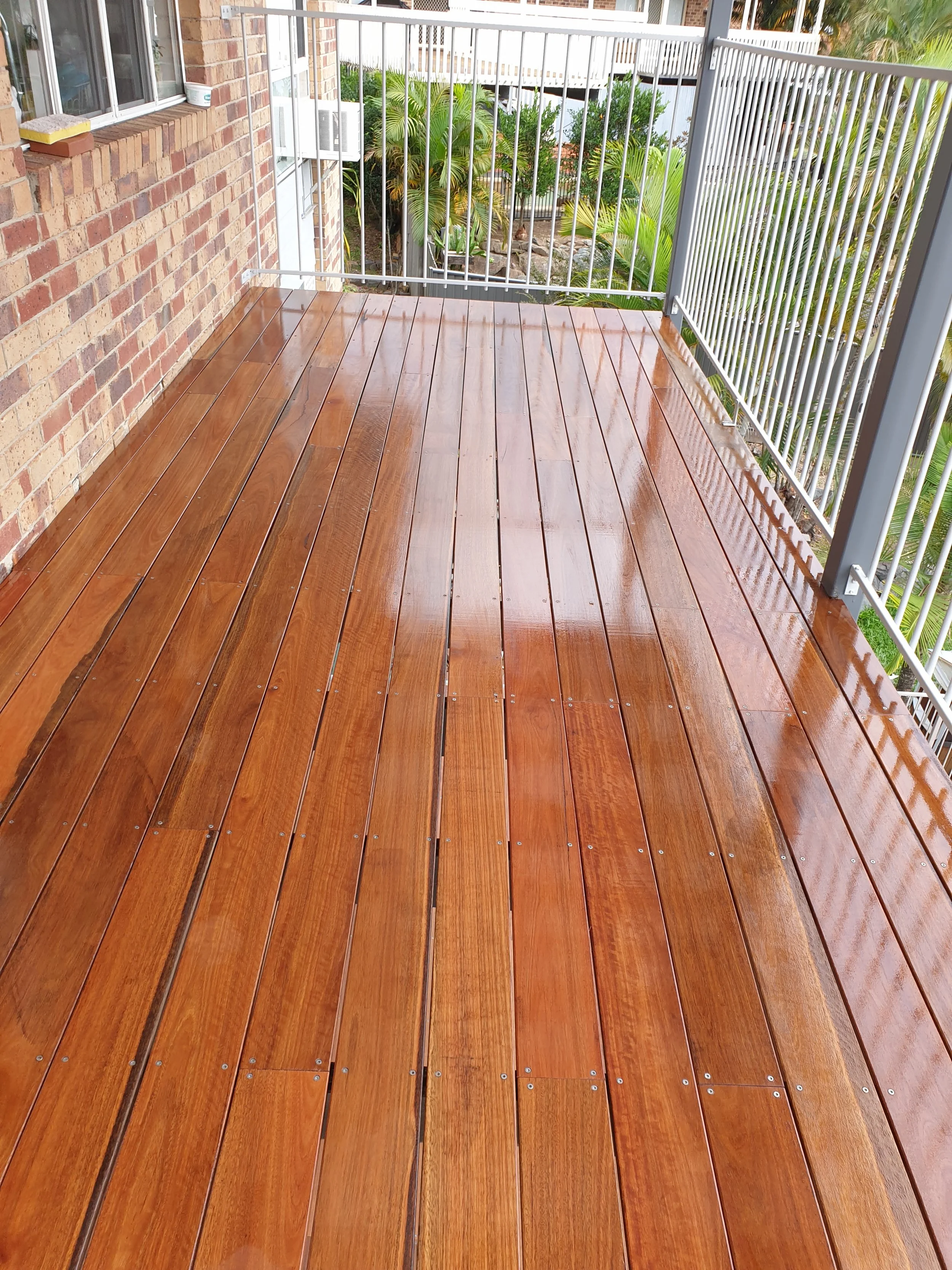 External timber stained, wooden balcony deck.