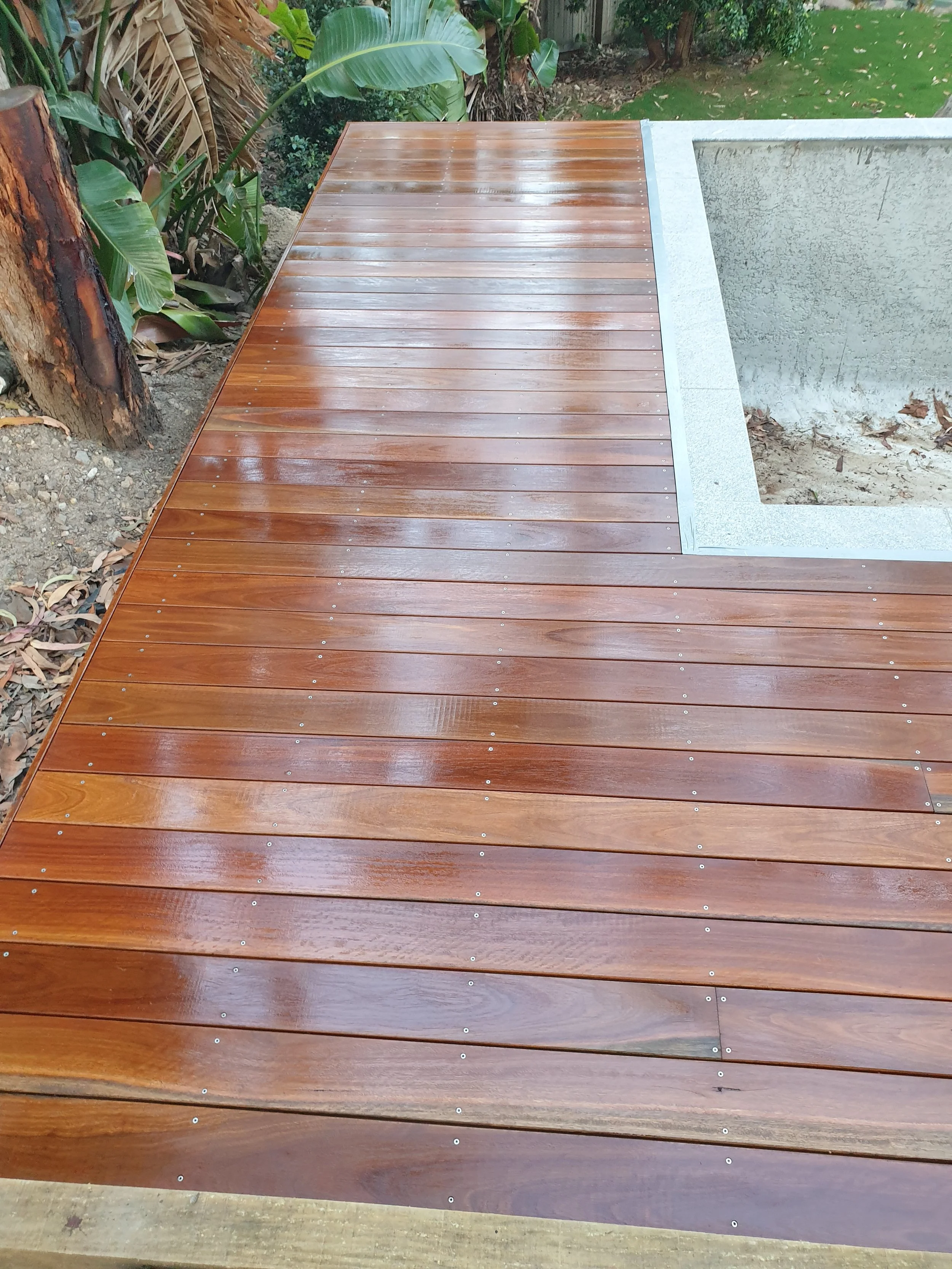Stained, oiled Merbau decking.