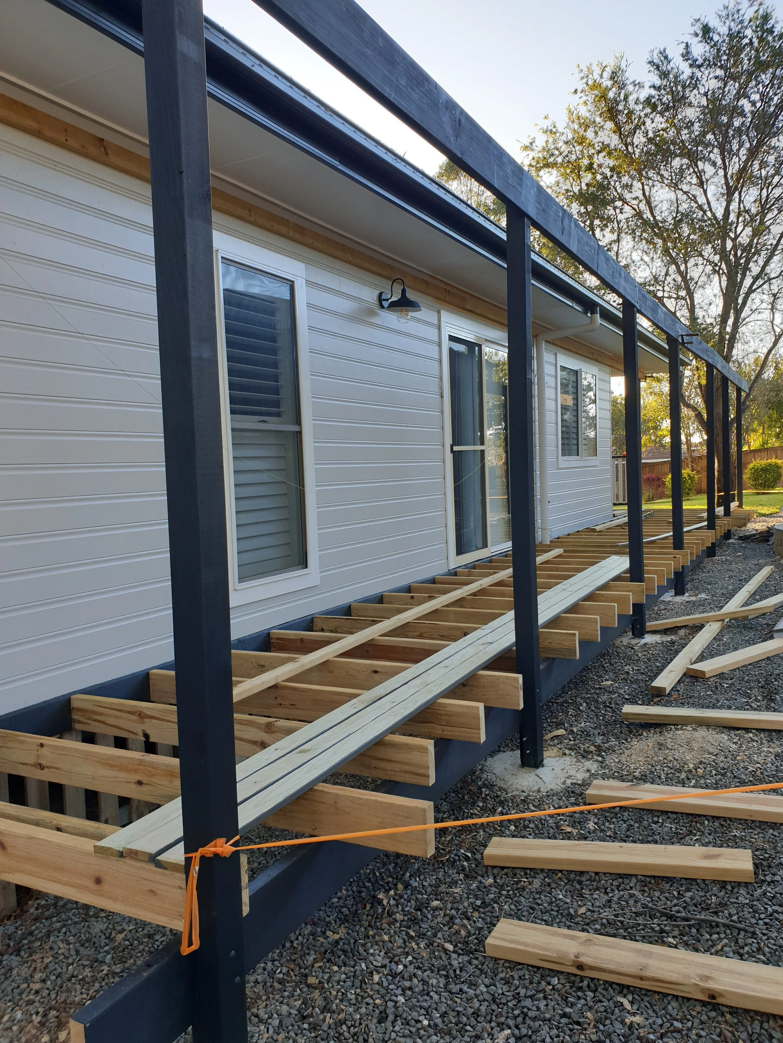 house with deck frame and base installed.