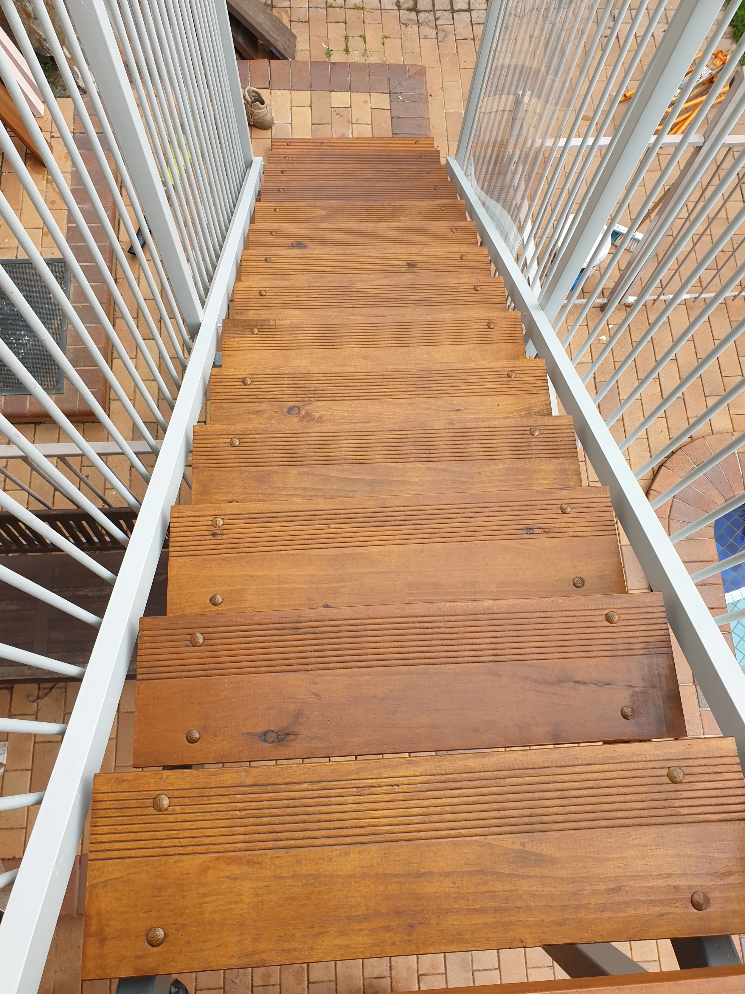 external stair case, wooden steps and wires balustrades. 