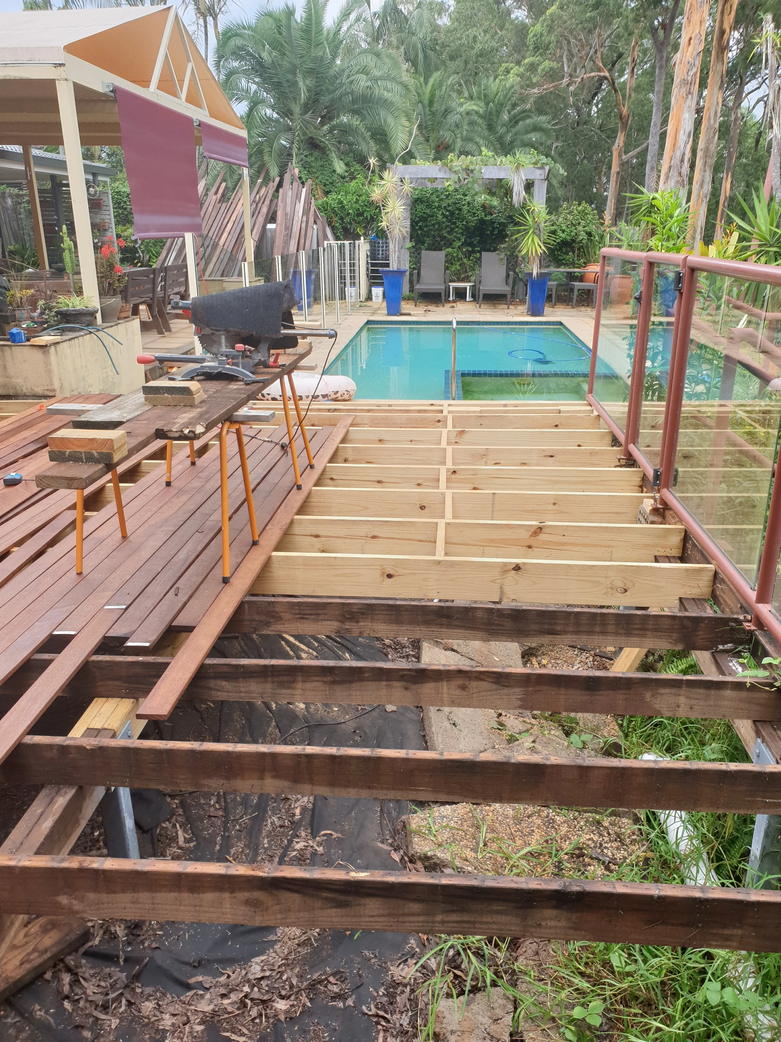 deck repairs, wooden timber frame, swimming pool.