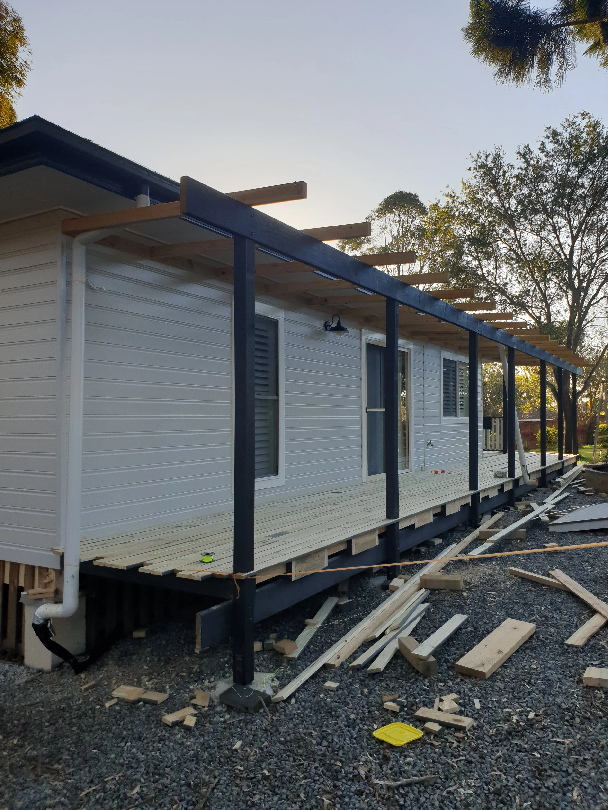 House with decking in progress. wooden deck. 