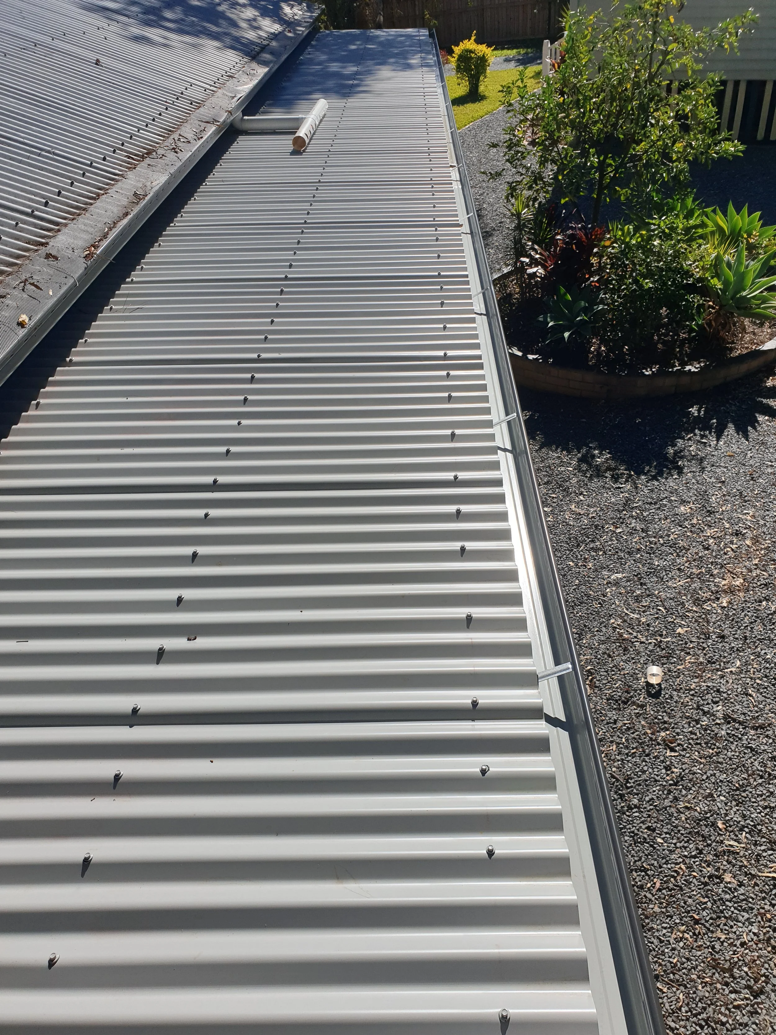 corrugated iron roofing, back verandah.