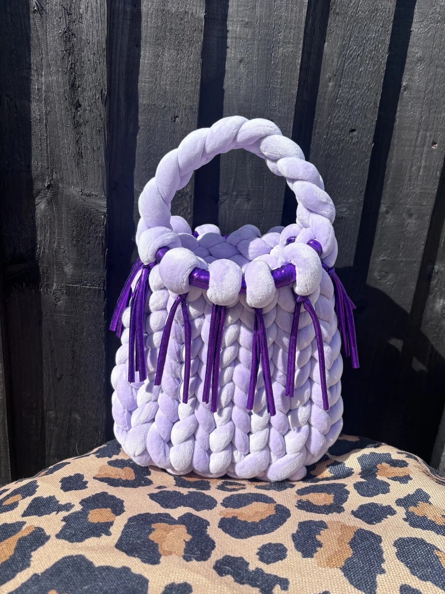 Lilac and purple tassel bag