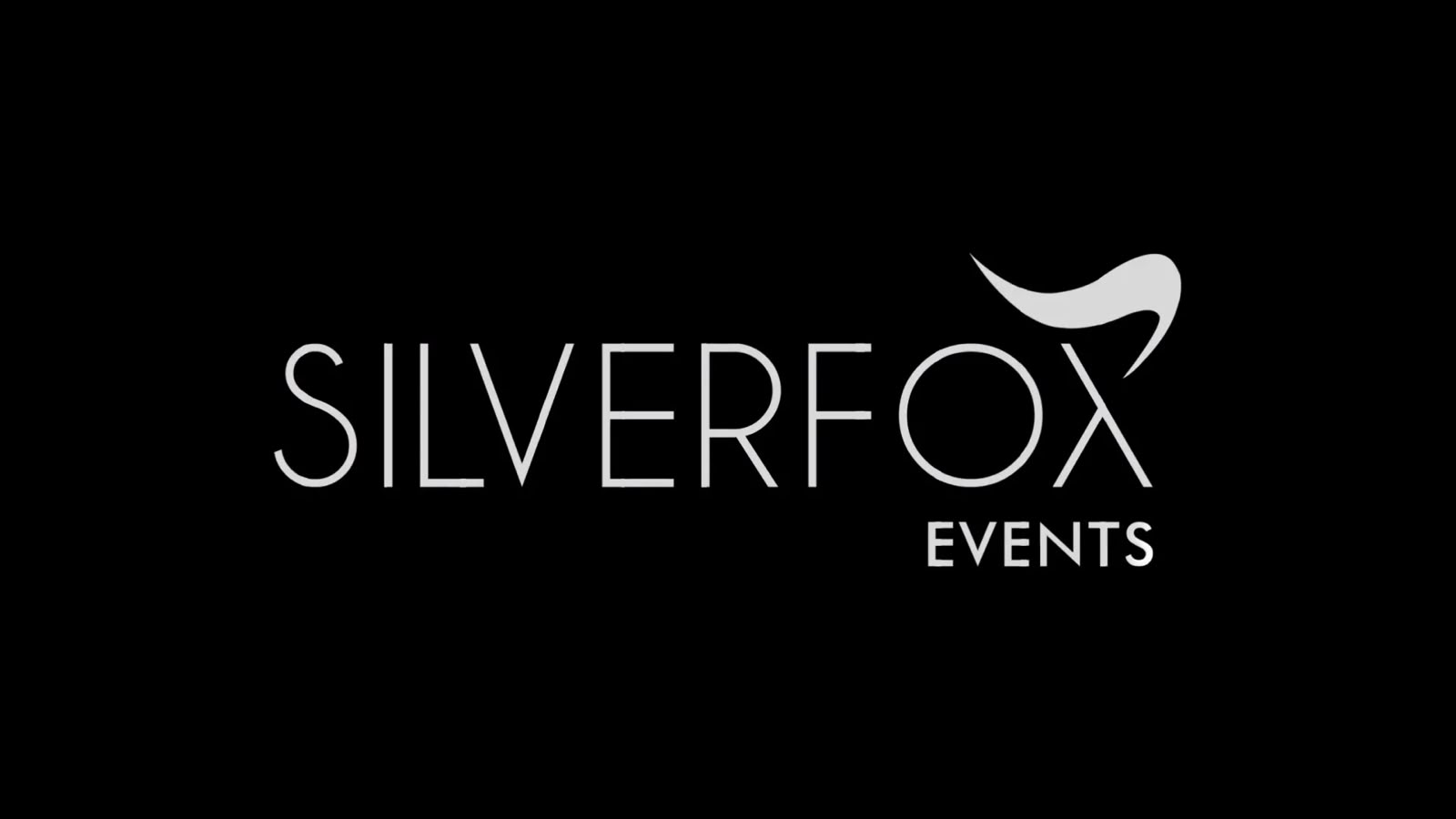 Logo for Silver Fox Events with a black background and stylized white fox tail above the word 'Silver'.