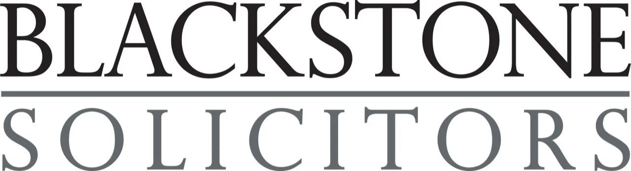 Blackstone Solicitors logo in black, gray, and white text.