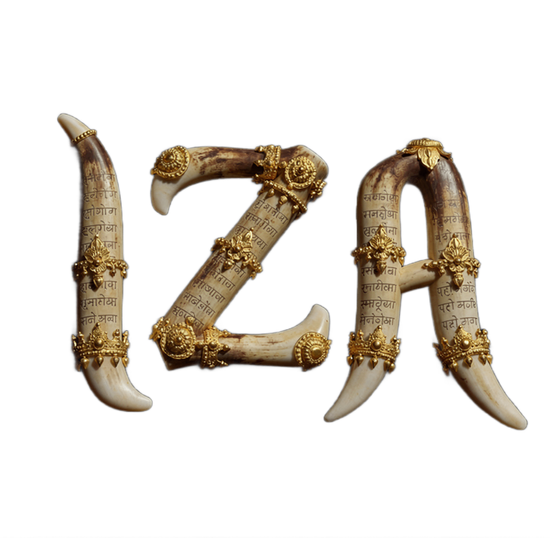 Decorative symbol composed of elephant tusk-like pieces with Sanskrit inscriptions, adorned with gold jewelry, set against a black background.
