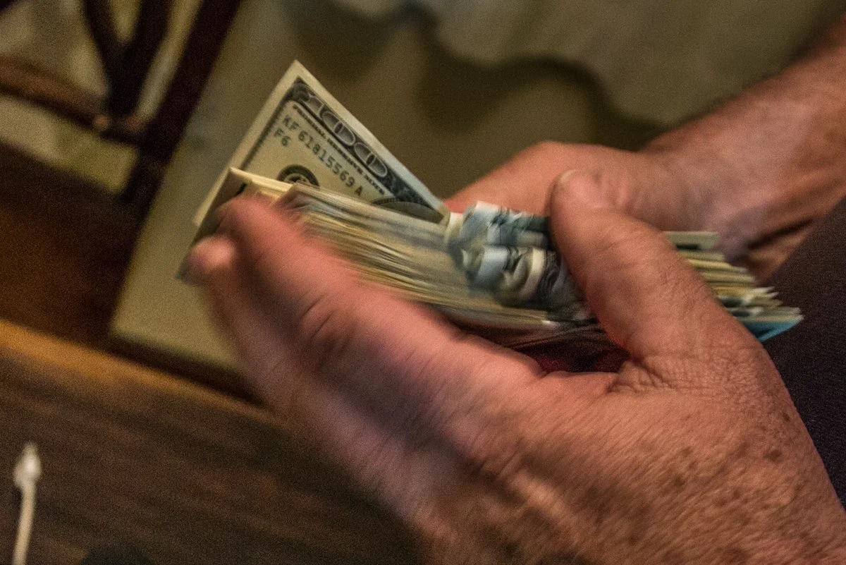 Paying to be smuggled into an African war.   ©Robert Young Pelton, all rights reserved. 