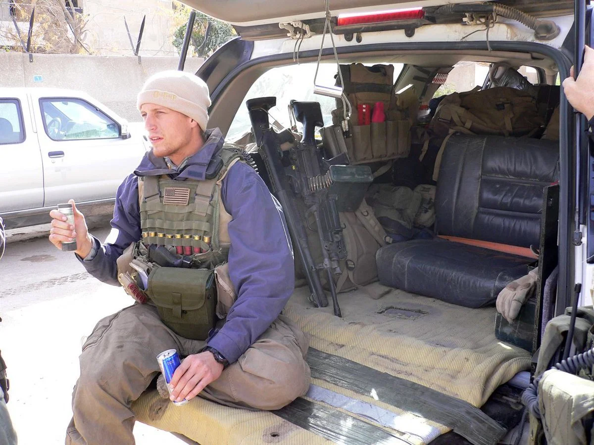 A Blackwater contractor is a tail gunner in the Hate Truck in Iraq.   ©Robert Young Pelton, all rights reserved. 