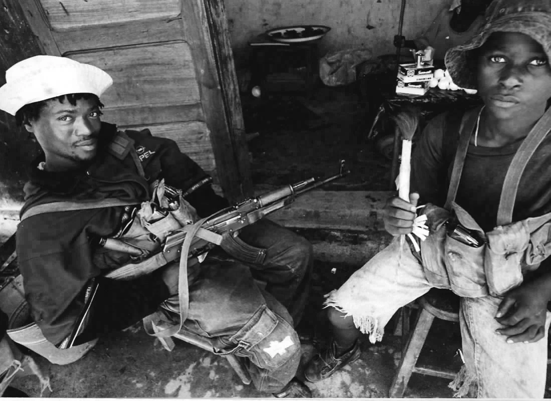 Child soldiers of the LURD rebels in the Small Boys Unit in Voinjama, Liberia. ©Robert Young Pelton. all rights reserved. 