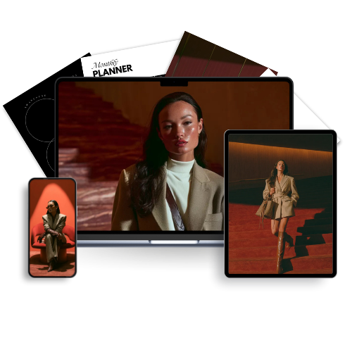 A woman appears on a laptop and two tablets, all showing her in different poses and settings, with background objects including a monthly planner and notebooks.