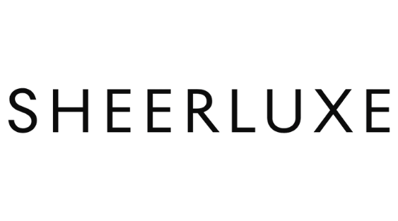 The word "SHEERLUXE" written in large black letters on a plain black background.