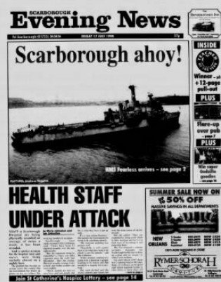 Black and white newspaper front page with the headline 'Scarborough ahoy!' showing a ship on water; includes other headlines and advertisements.