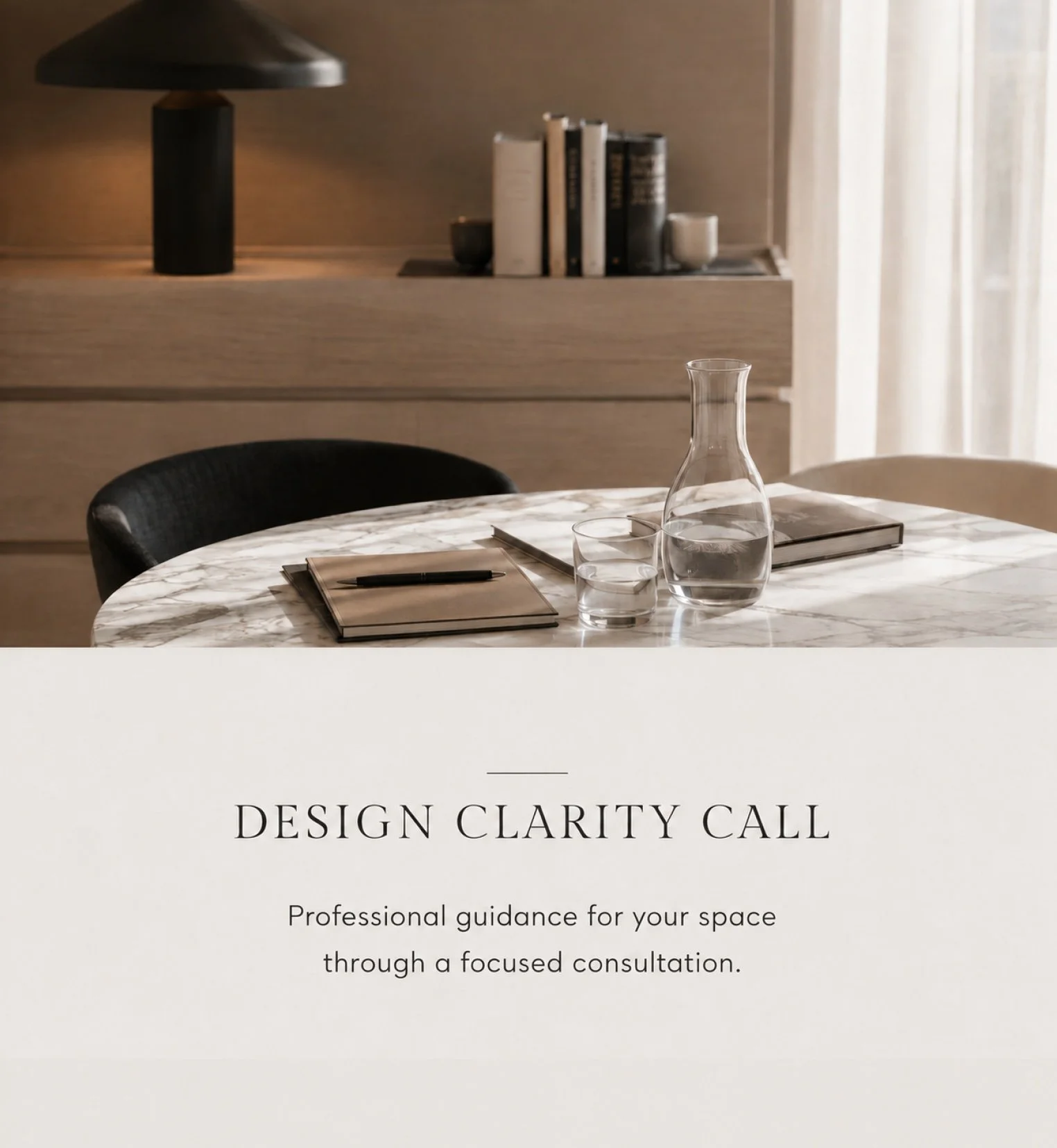 A printed brochure cover titled 'Design Clarity Call' with a subtitle about professional guidance, featuring a picture of a marble table with a glass water pitcher, a glass, a notebook, and a pen, in a modern interior setting.