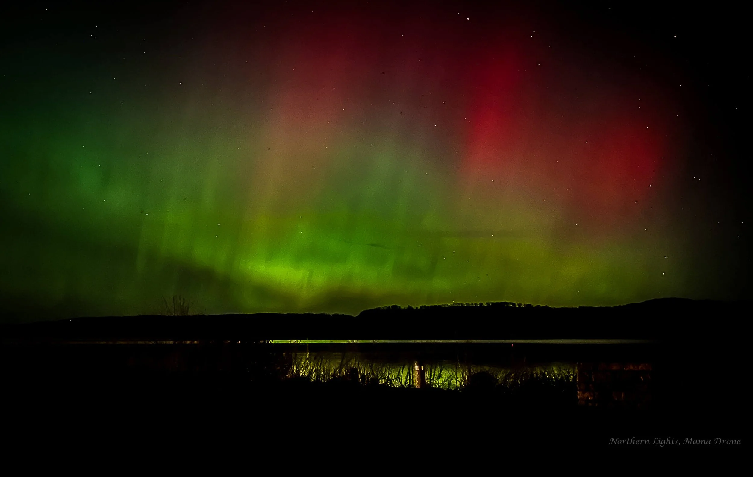 Nighttime Photography: I enjoy staying up late to capture wonders of the world.  These vibrant northern lights were photographed over Lake Pepin WI and MN!