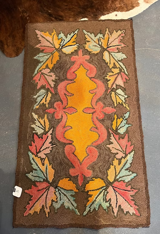 1930's Canadian Hooked Rug:
Gorgeous variegated background.
Excellent condition
($395)