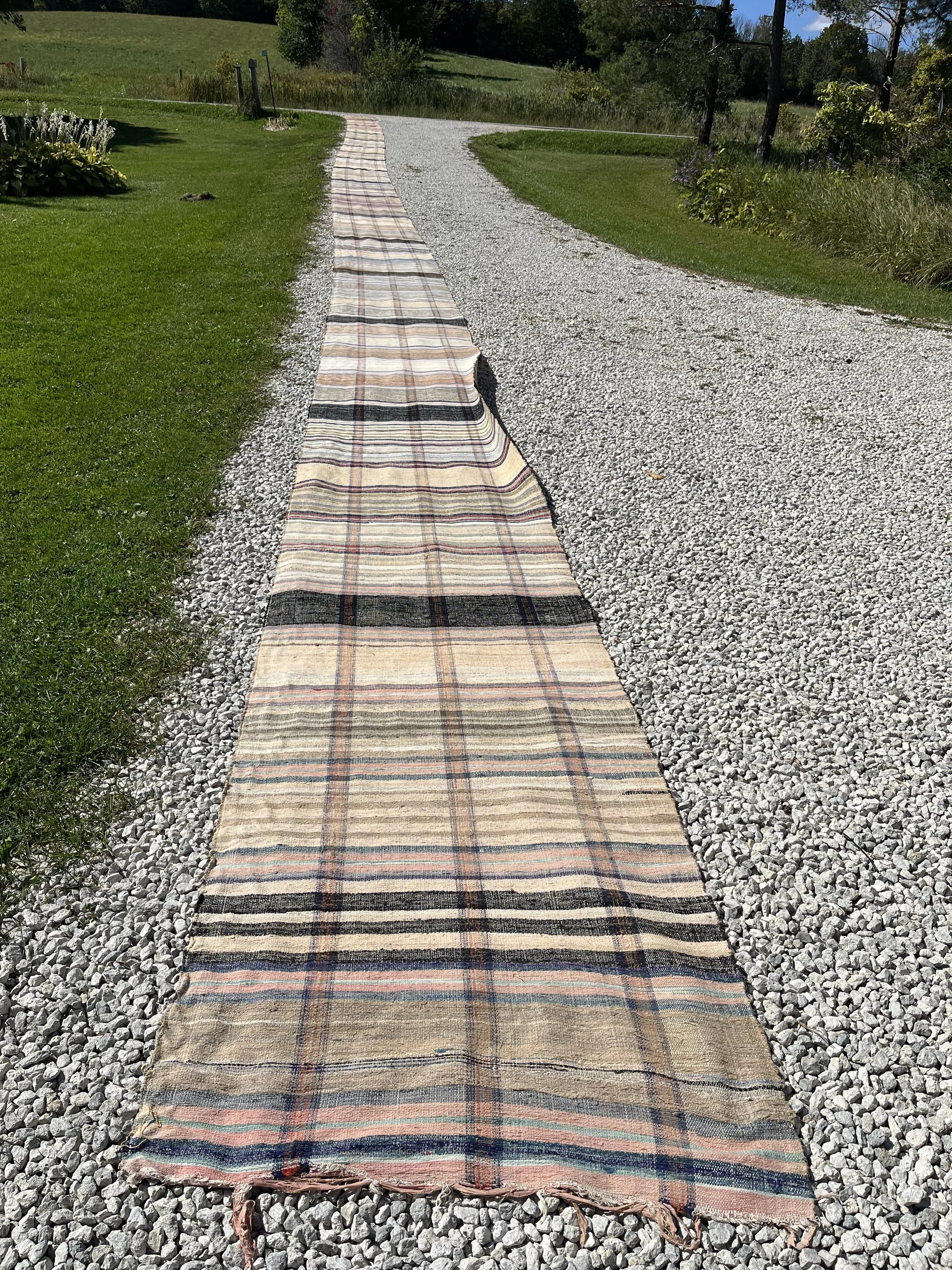 97 feet!  Catalogne- Quebec ,36" wide.  This is truly one of a kind.  Probably created for a church or grand manor.  One continuous weave.  ($950)