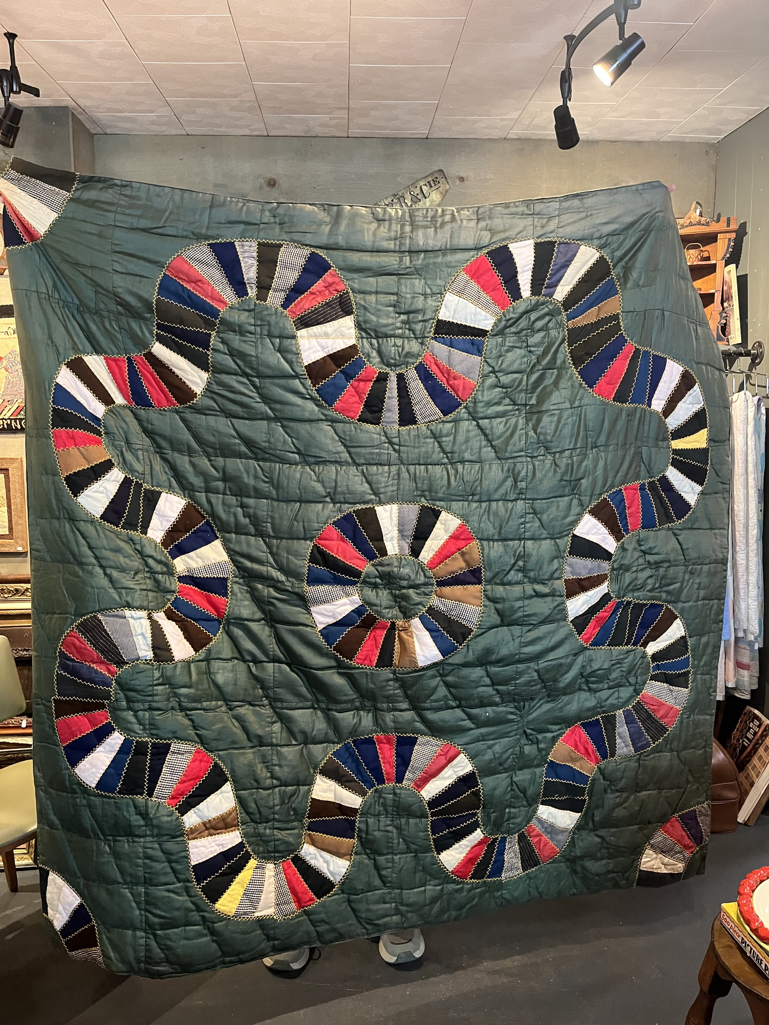 Coiled Serpent Quilt- This is a heavy piece- more of a comforter. 54 x 70" One mend.  ($225)
