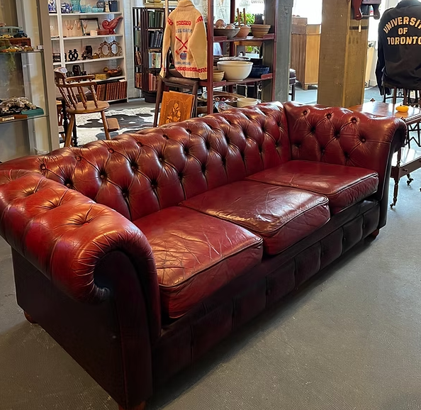 
Red Leather Tufted Couch:
Recently reconditioned.
6 1/2" long
($2000)
