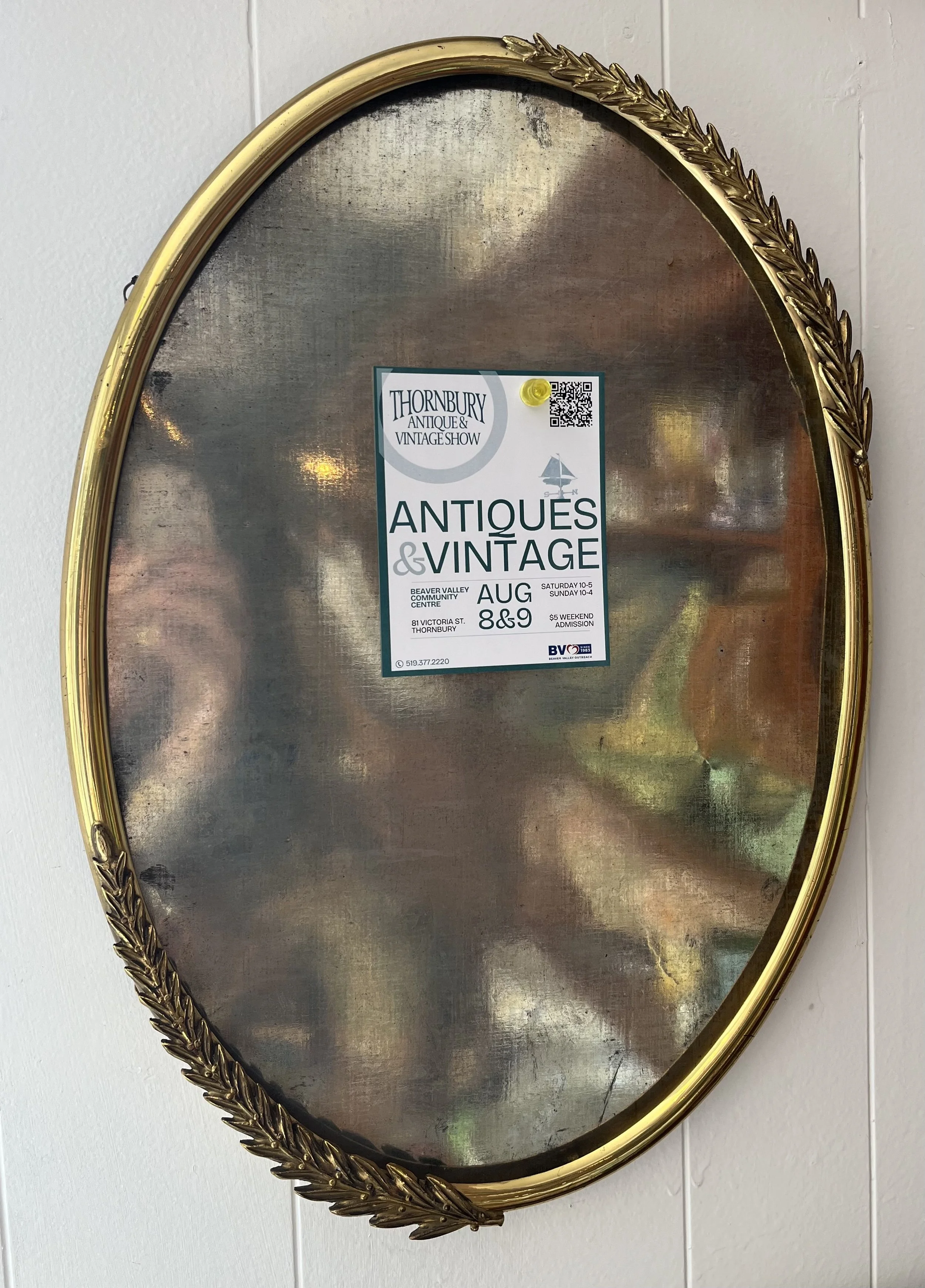 Metallic oval frame- This would have had curved glass- but has been removed to make a metallic surface to use for display.  Measures 30".  ($75)