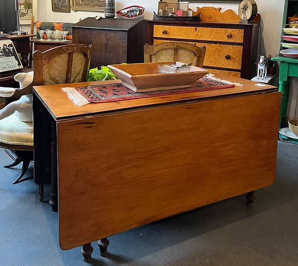 Pine Drop Leaf Table: Top measures 21"w x 28"h and each leaf is 22' wide.  Spectacular!
($195)