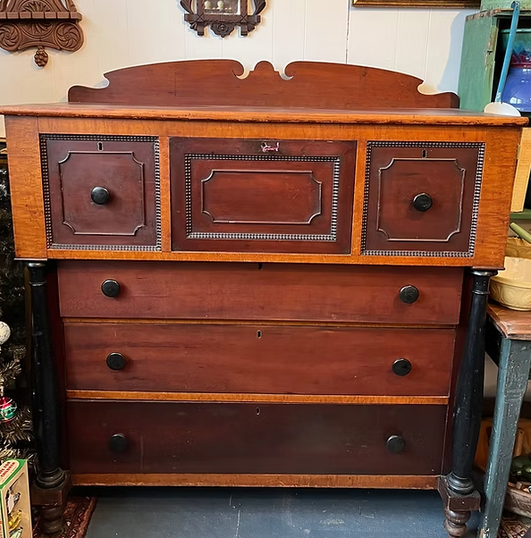 
Cherry and Birdseye Bonnet Chest:
Hidden drawers! The middle drawer opens to a desk. 
Measures 50 x 48 x 22"
($795)