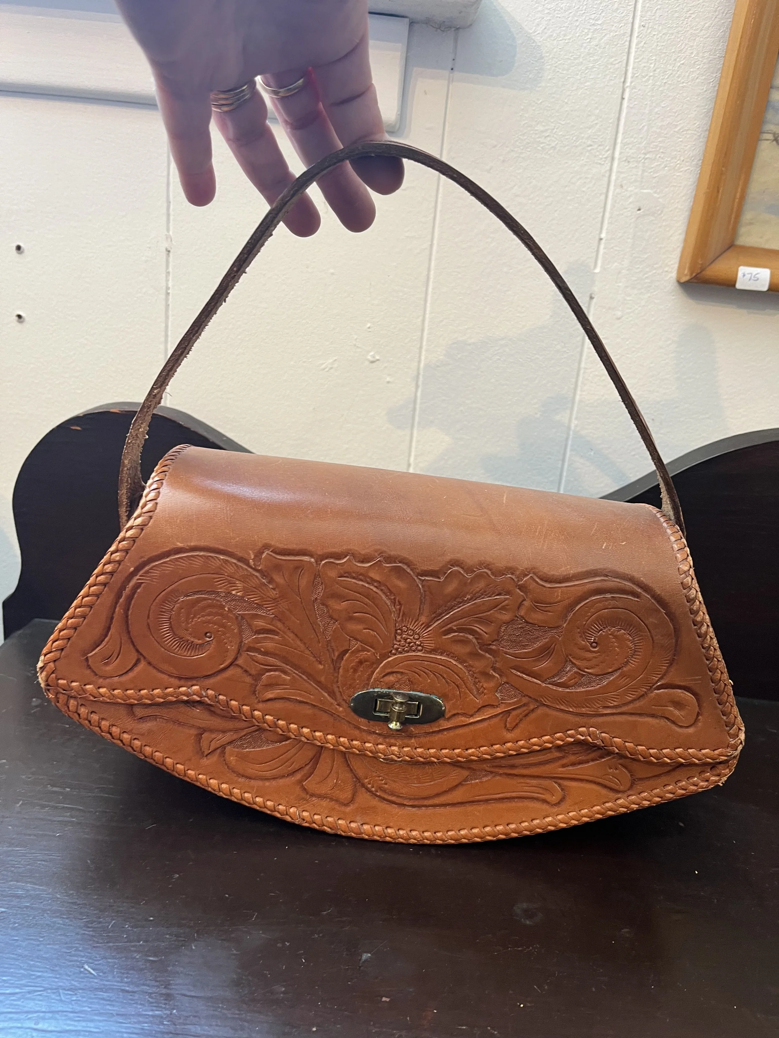 1970s tooled leather handbag ($75)