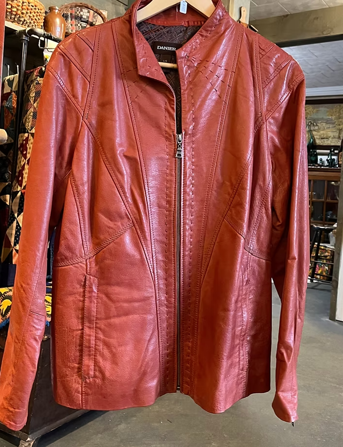Danier Leather Jacket: Size Large.
($95)