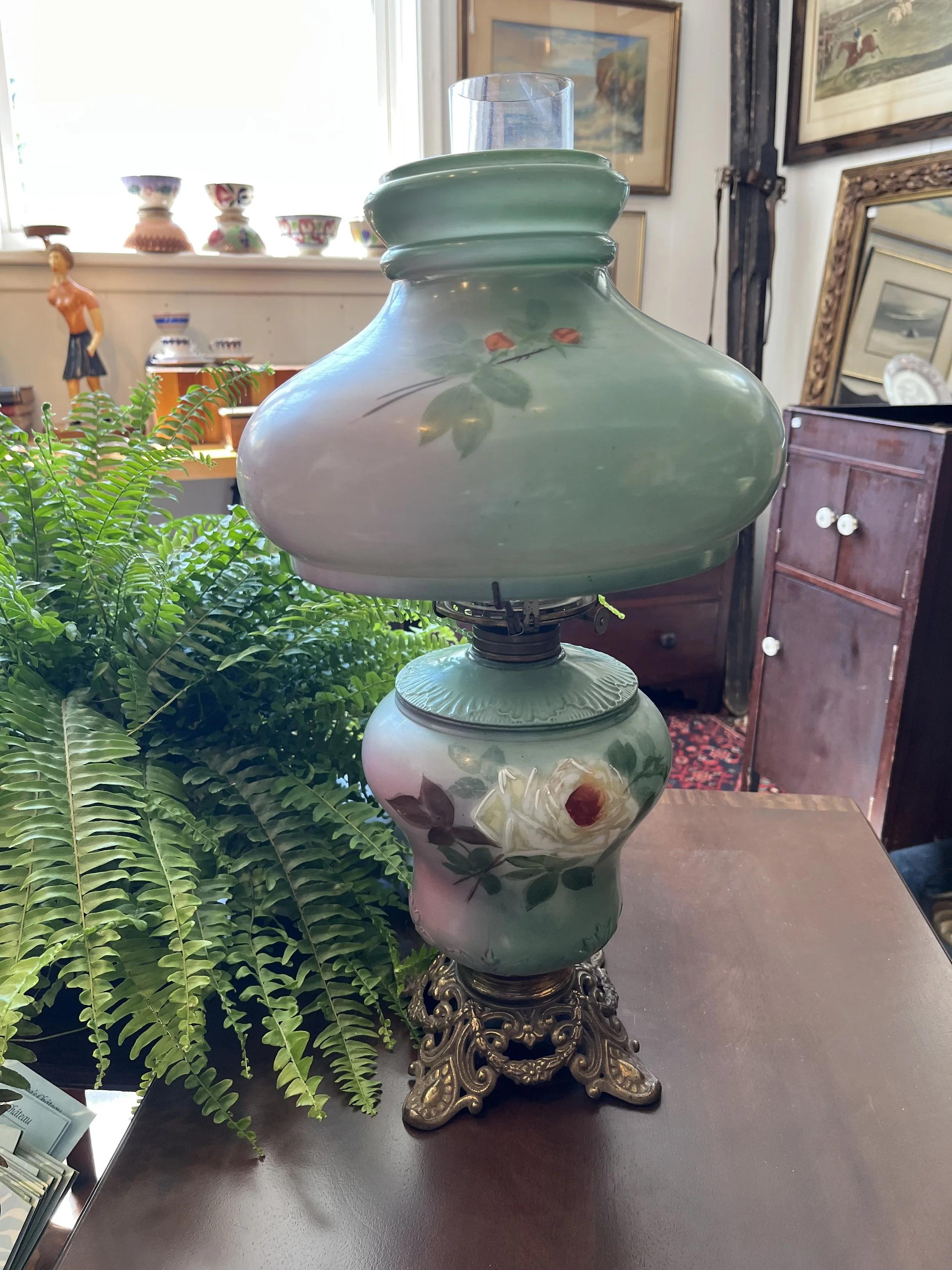 Gone with the wind oil lamp.  Floral in excellent condition. Measures 20" ($145)
