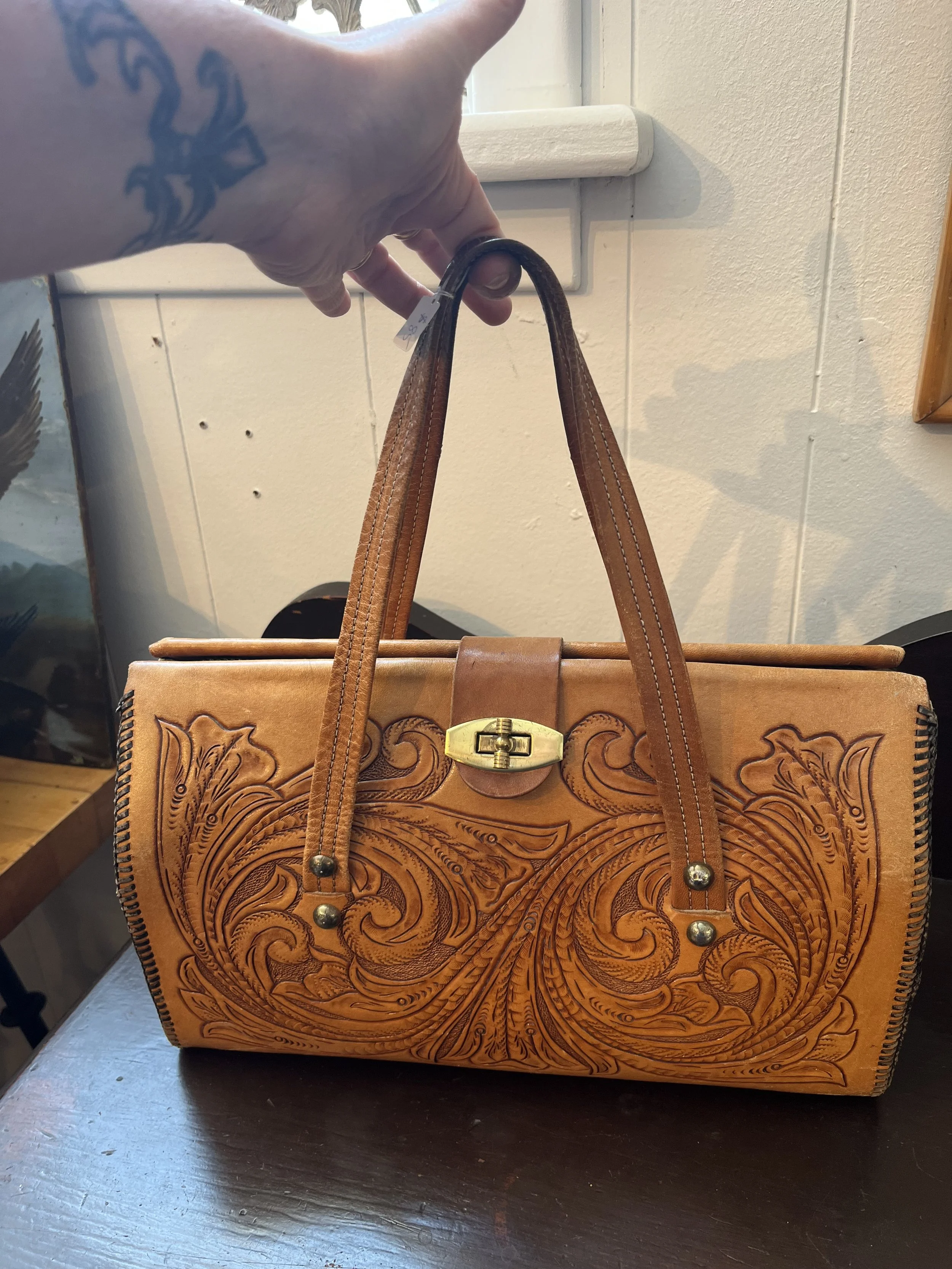 1970s tooled leather purse- ($85)