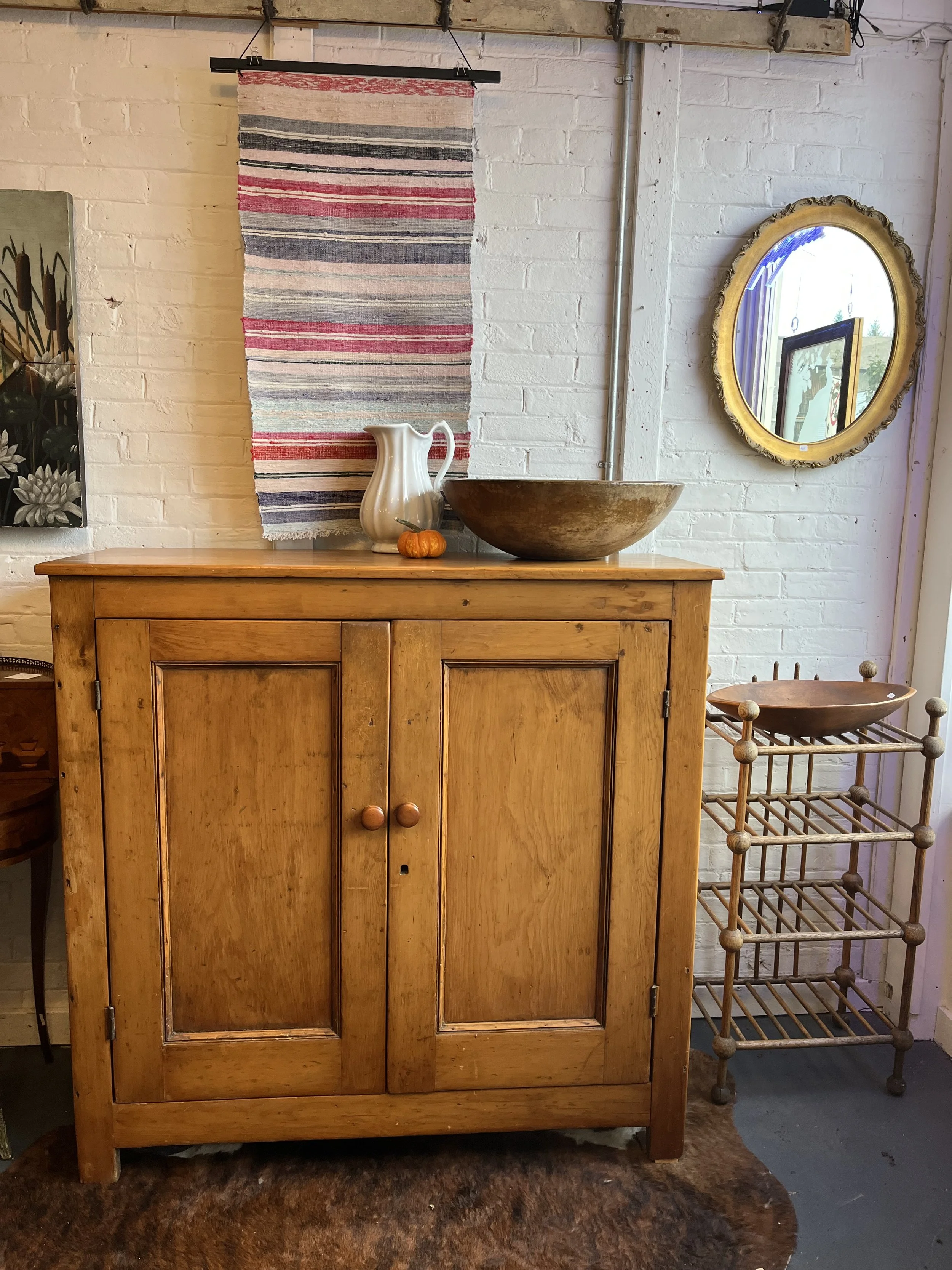 1850s pine cupboard with three shelves.  Measures 4' x 49 1/2" x 20". 
($625)
