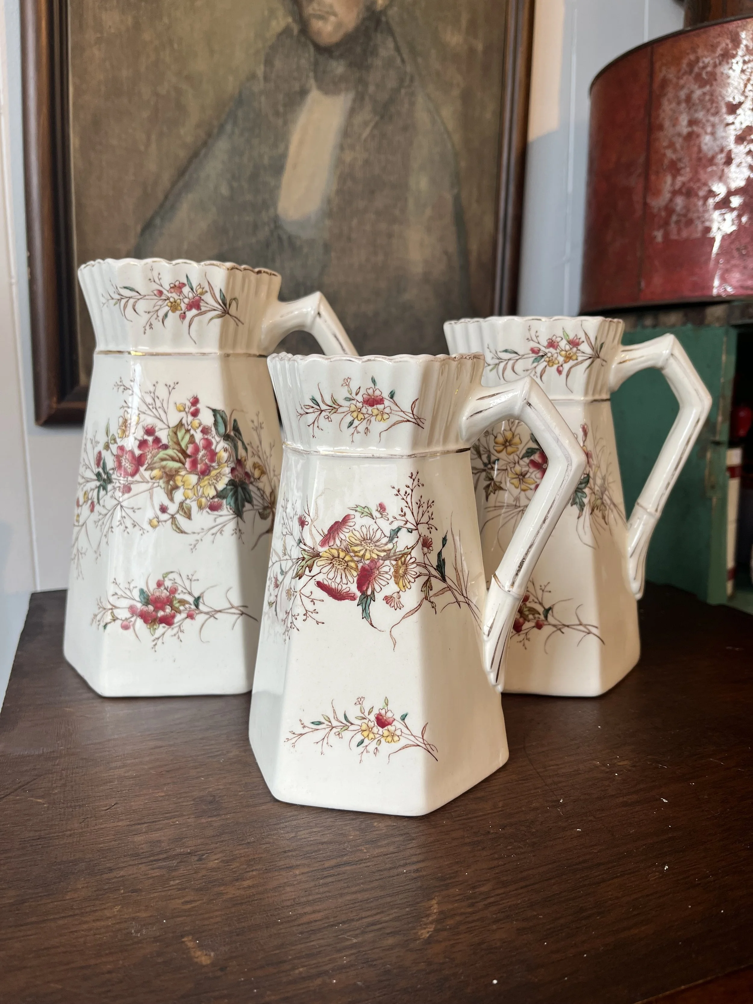 Set of three transferware victorian pitchers. ($95 for the set of 3)