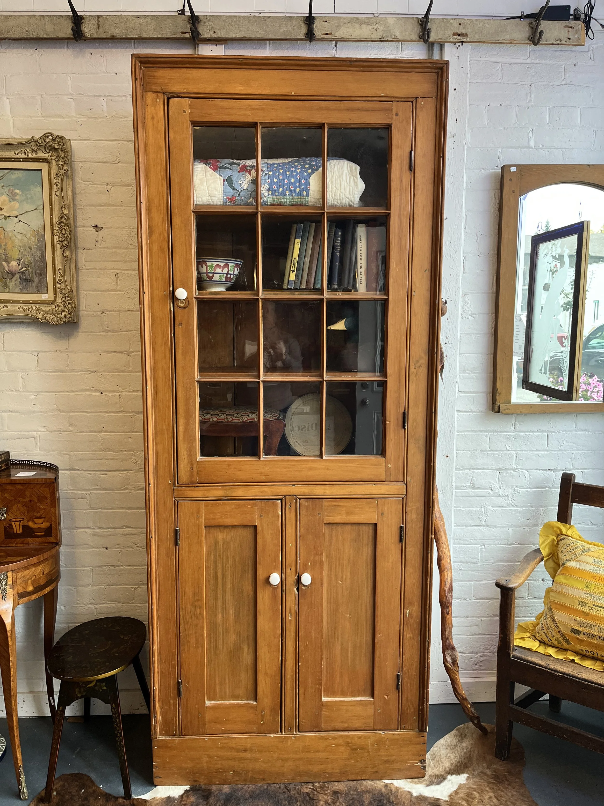 Pine flat to wall.  Shelves on top and bottom.  circa 1880.  84" x 15 1/2" x 33" (SOLD)