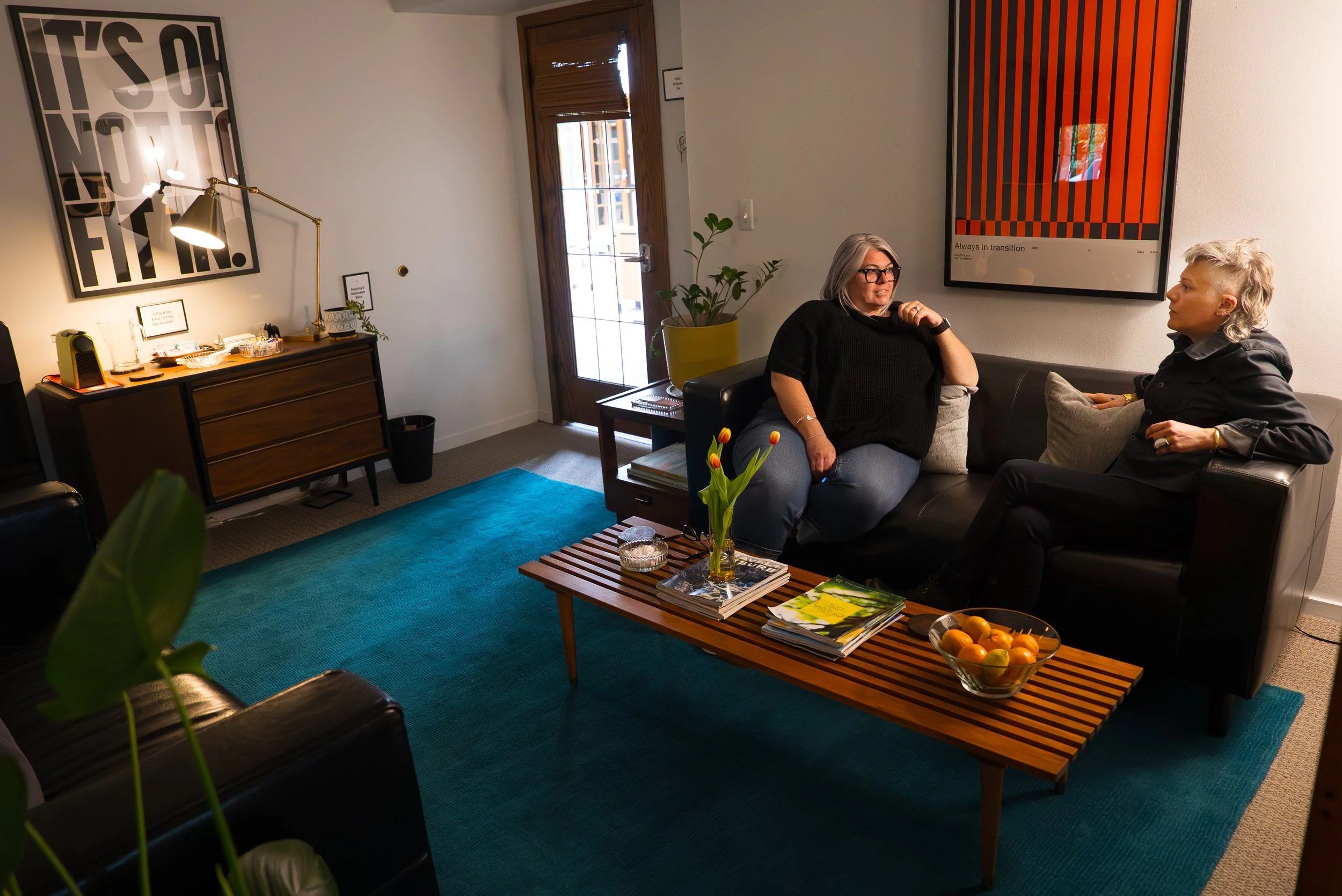 Warm and welcoming therapy office in Ann Arbor, Michigan with natural light and comfortable seating.