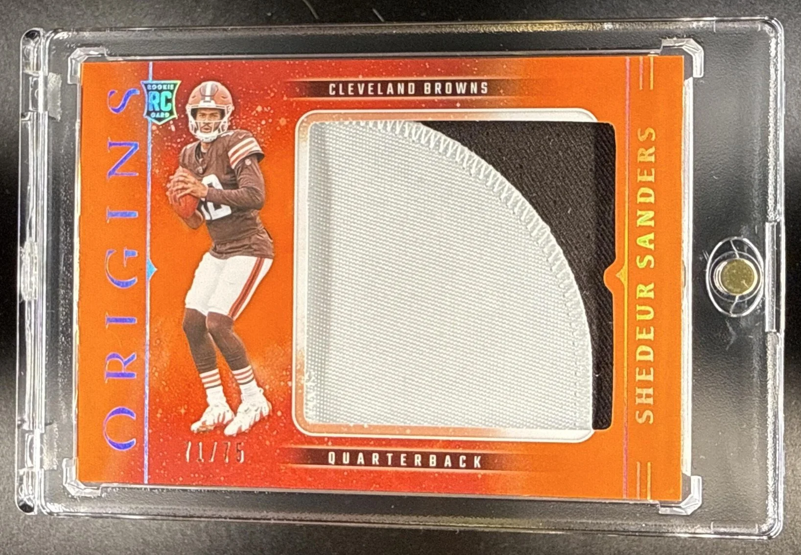 177_2025_PANINI_ORIGINS_SHEDEUR_SANDERS_RJY_SSS_ROOKIE_JUMBO_JERSEY_ORANGE_75_RC.jpg